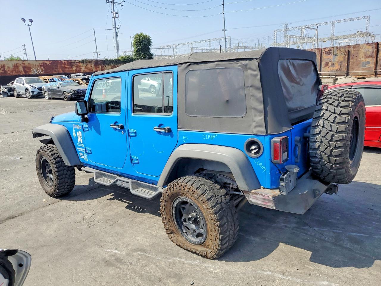 2012 Jeep Wrangler Unlimited Sport - Фото 2