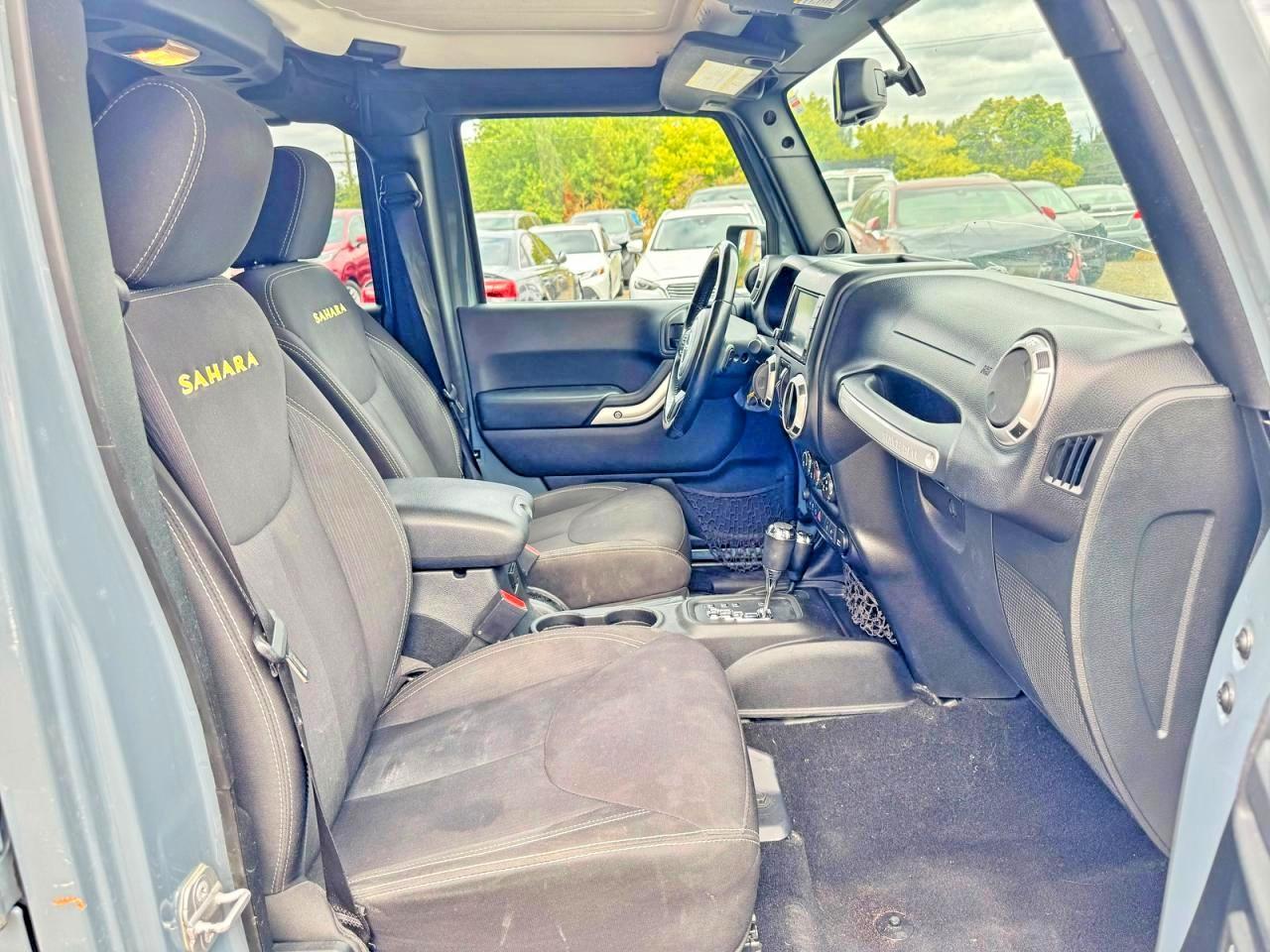 2014 Jeep Wrangler Unlimited Sahara - Фото 5