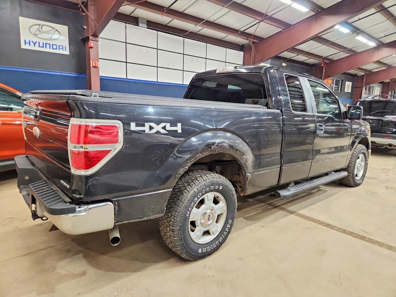 2013 Ford F150 Super Cab - Фото 3