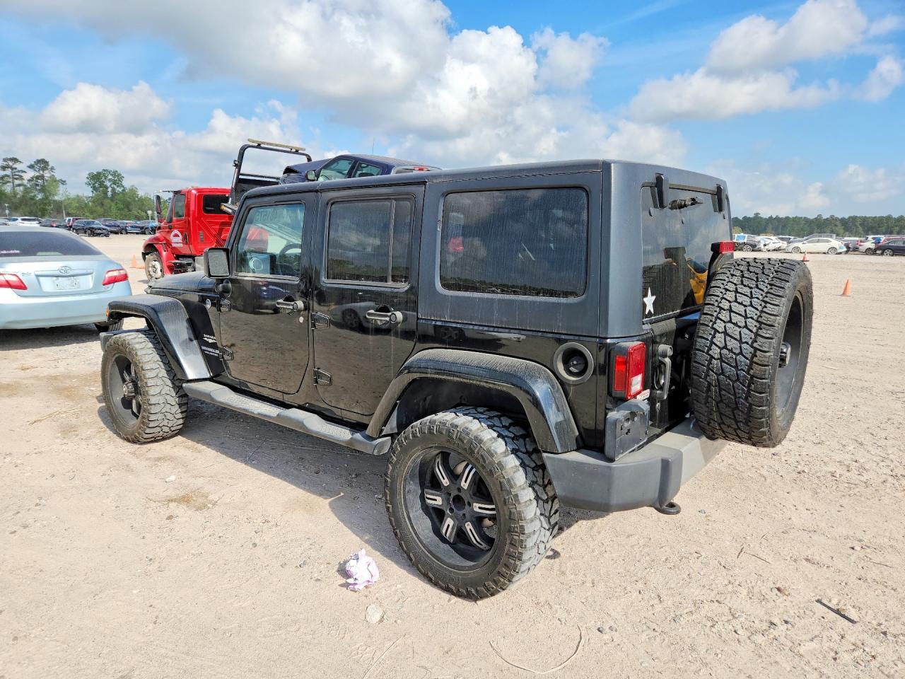 2013 Jeep Wrangler Unlimited Sahara - Фото 2