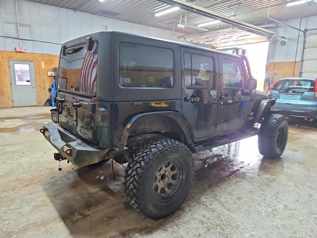 2012 Jeep Wrangler Unlimited Sahara - Фото 3