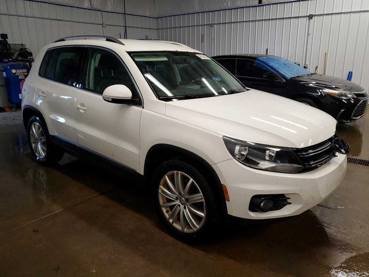 2013 Volkswagen Tiguan S - Фото 4