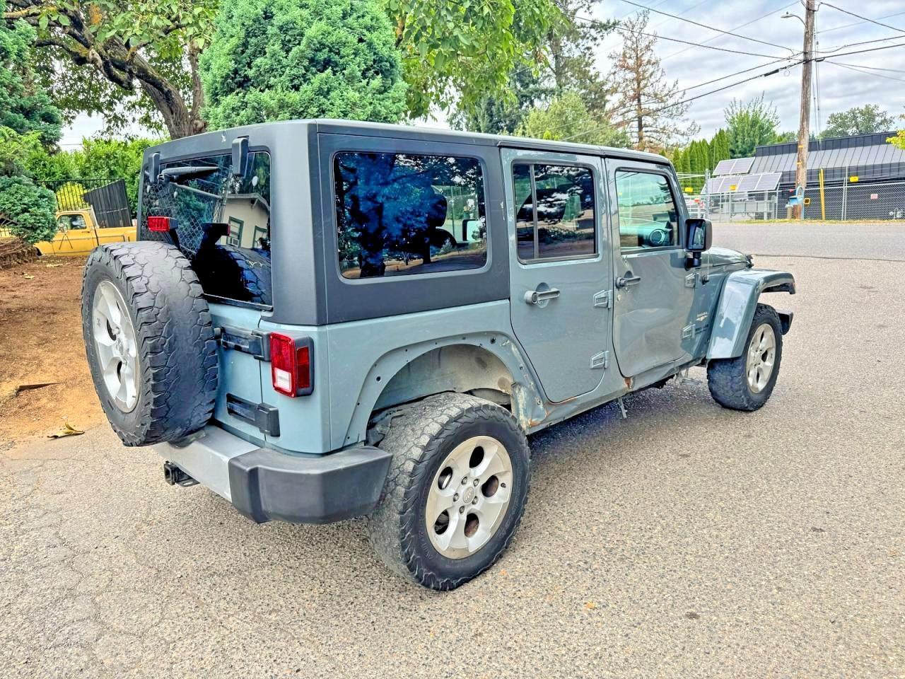 2014 Jeep Wrangler Unlimited Sahara - Фото 4