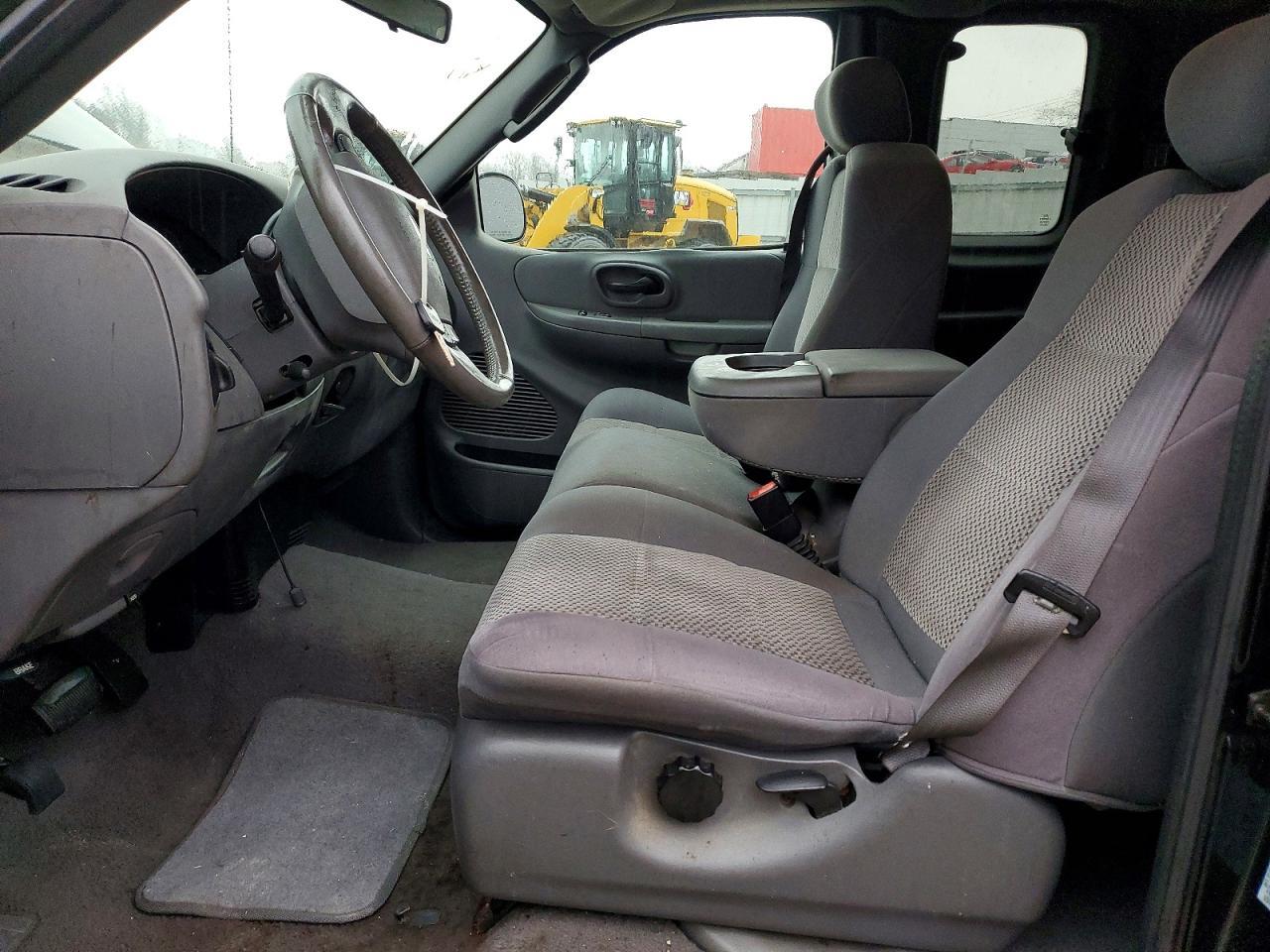 2003 Ford F150 - Фото 7
