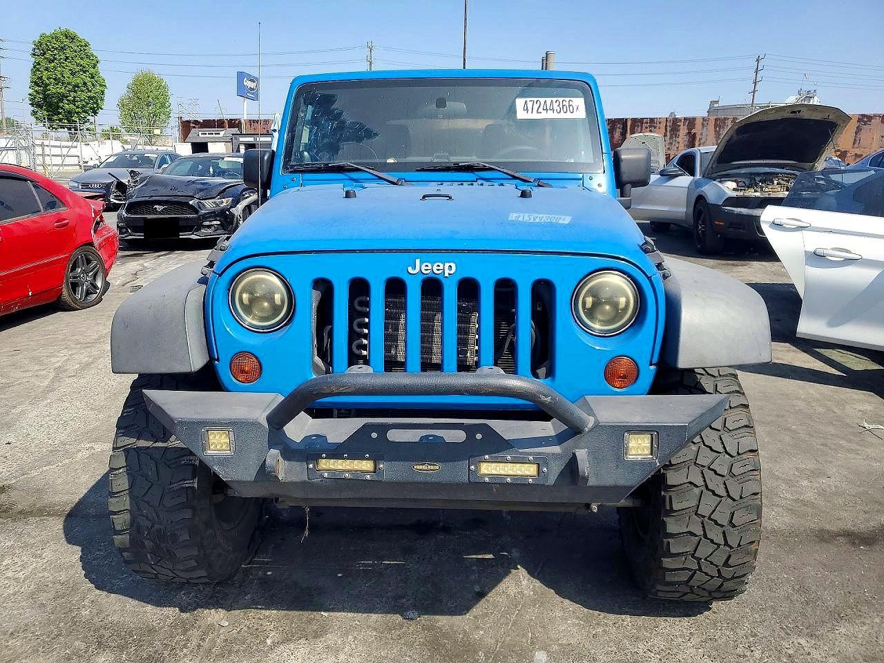 2012 Jeep Wrangler Unlimited Sport - Фото 5