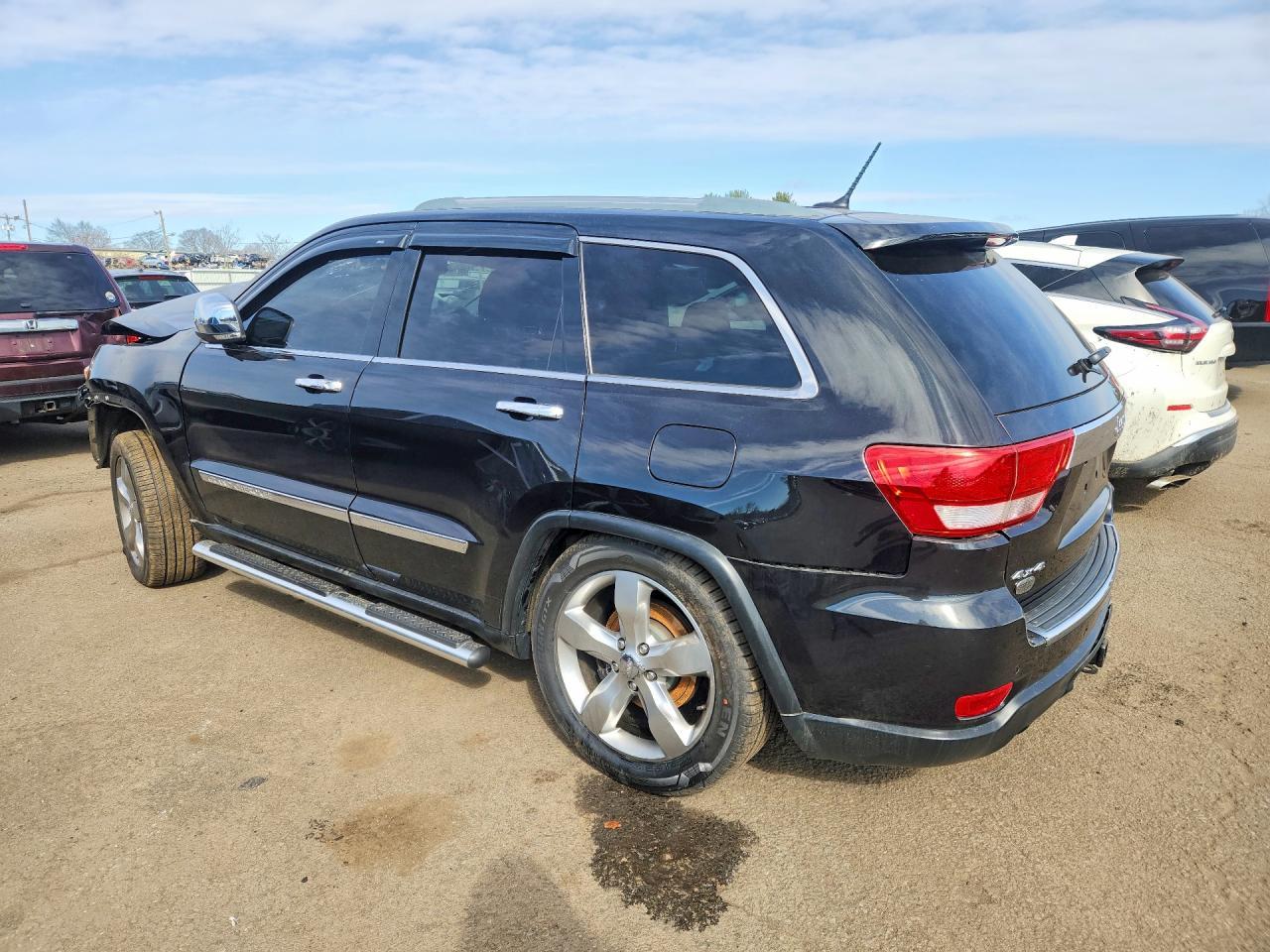 2011 Jeep Grand Cherokee Overland - Фото 2