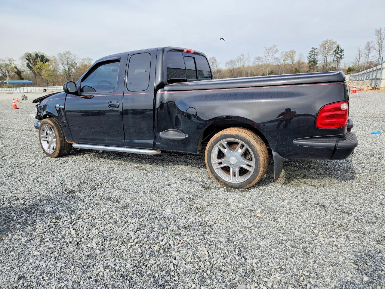 2000 Ford F150 - Фото 2