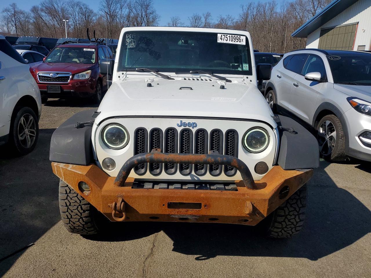2015 Jeep Wrangler Unlimited Sahara - Фото 5