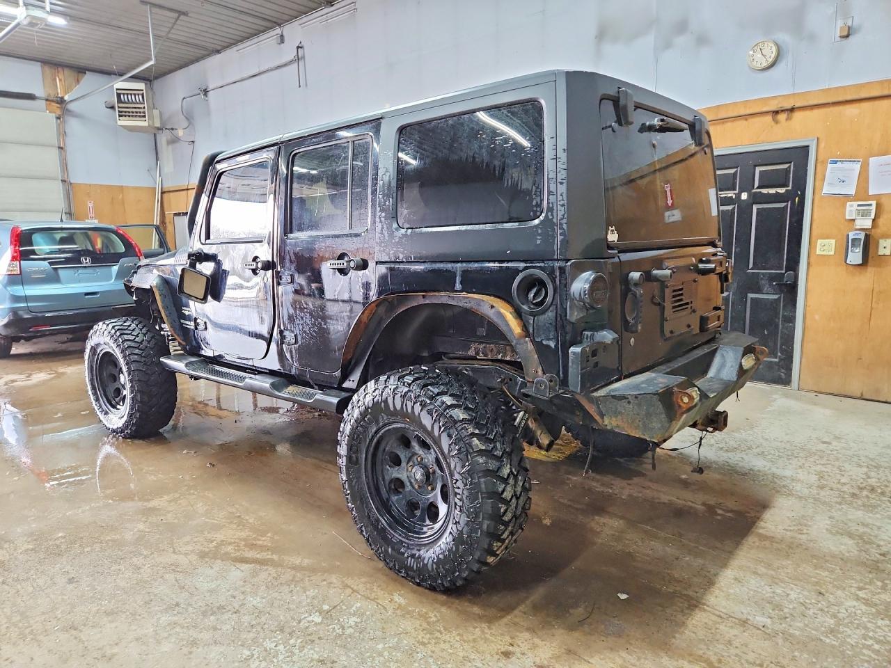 2012 Jeep Wrangler Unlimited Sahara - Фото 2