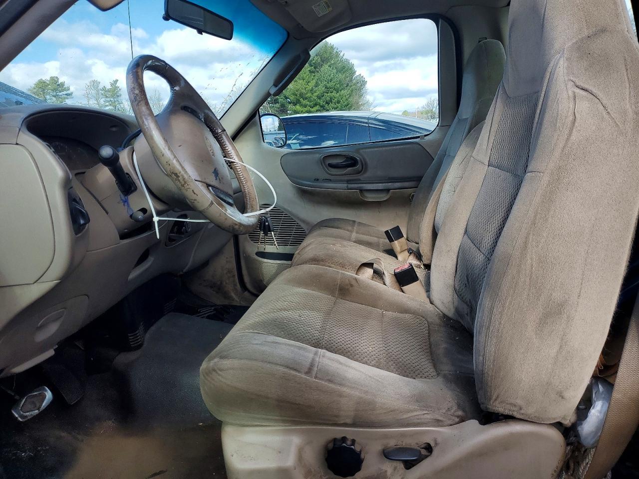 2002 Ford F150 - Фото 7