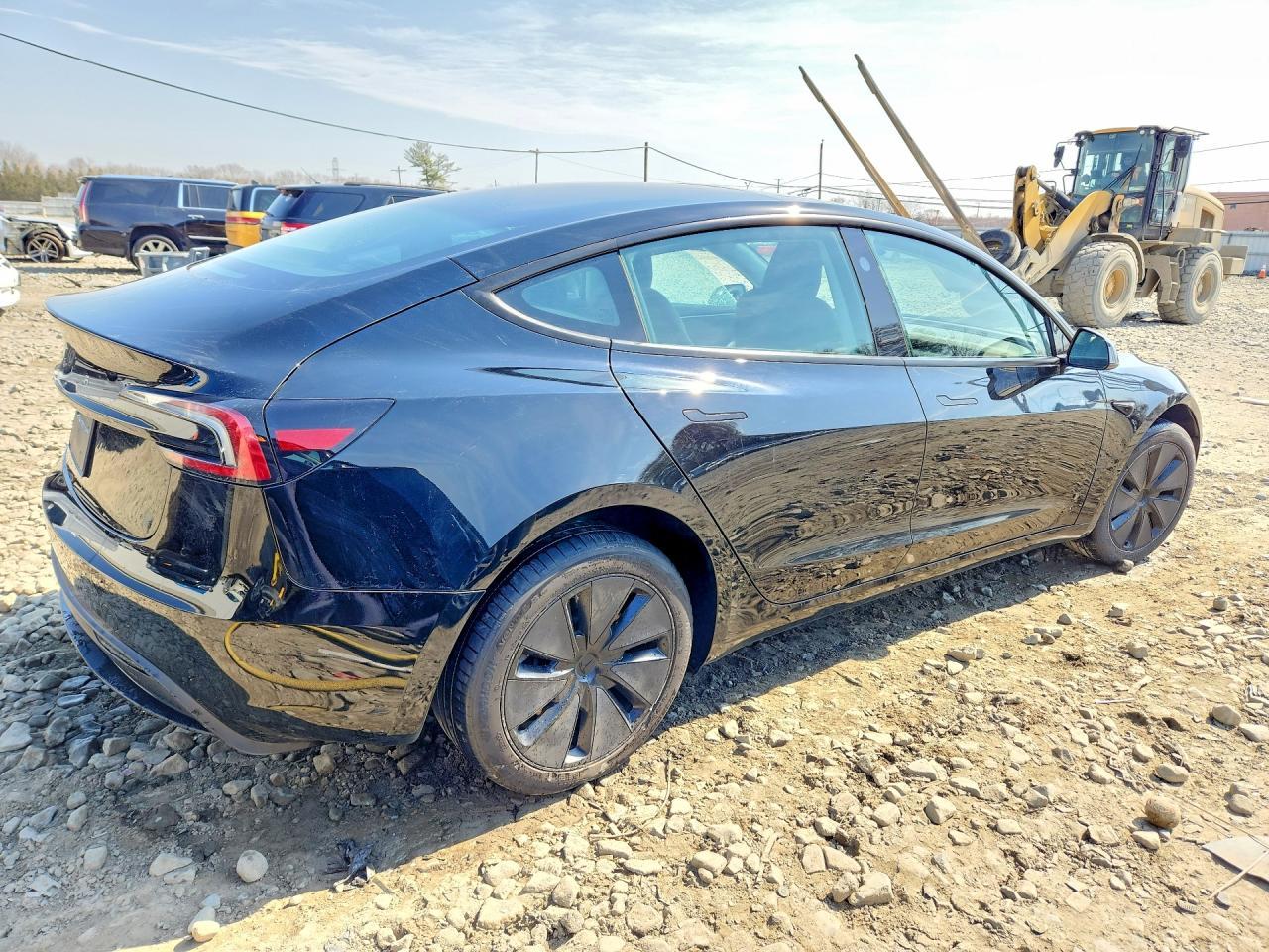 2025 Tesla Model 3 - Фото 3