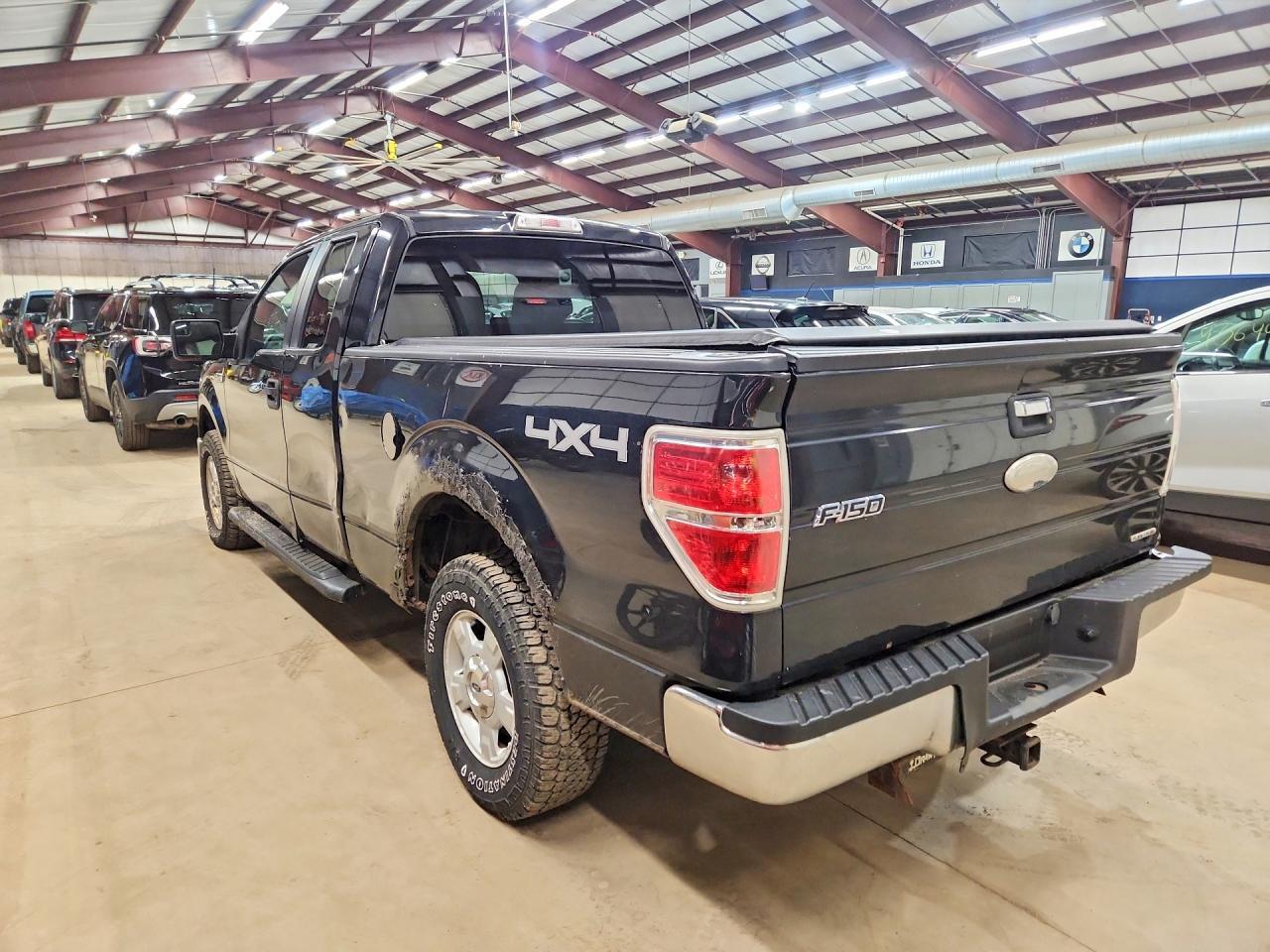 2013 Ford F150 Super Cab - Фото 2