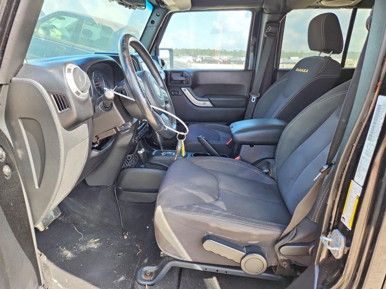 2013 Jeep Wrangler Unlimited Sahara - Фото 7