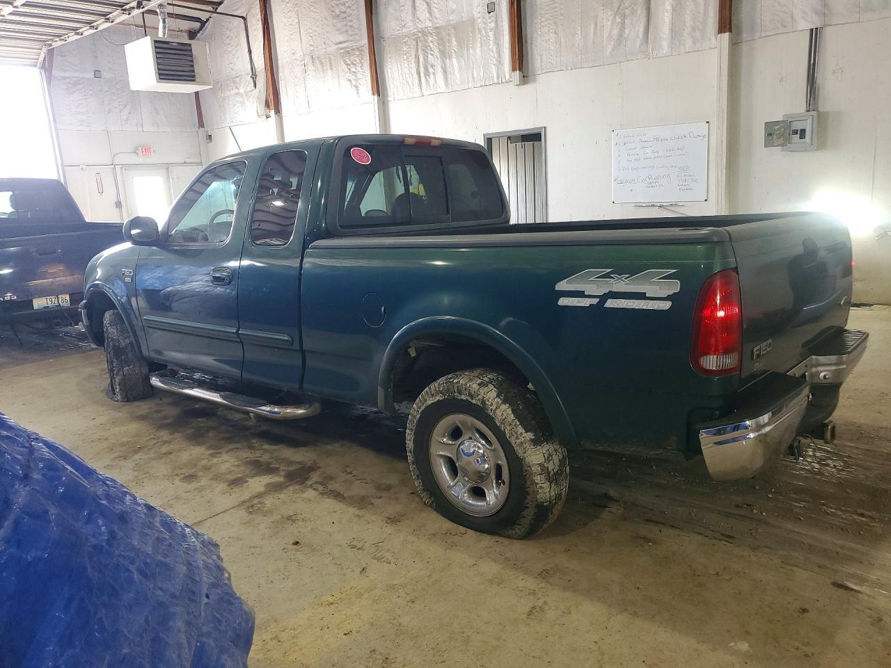 1999 Ford F150 - Фото 2