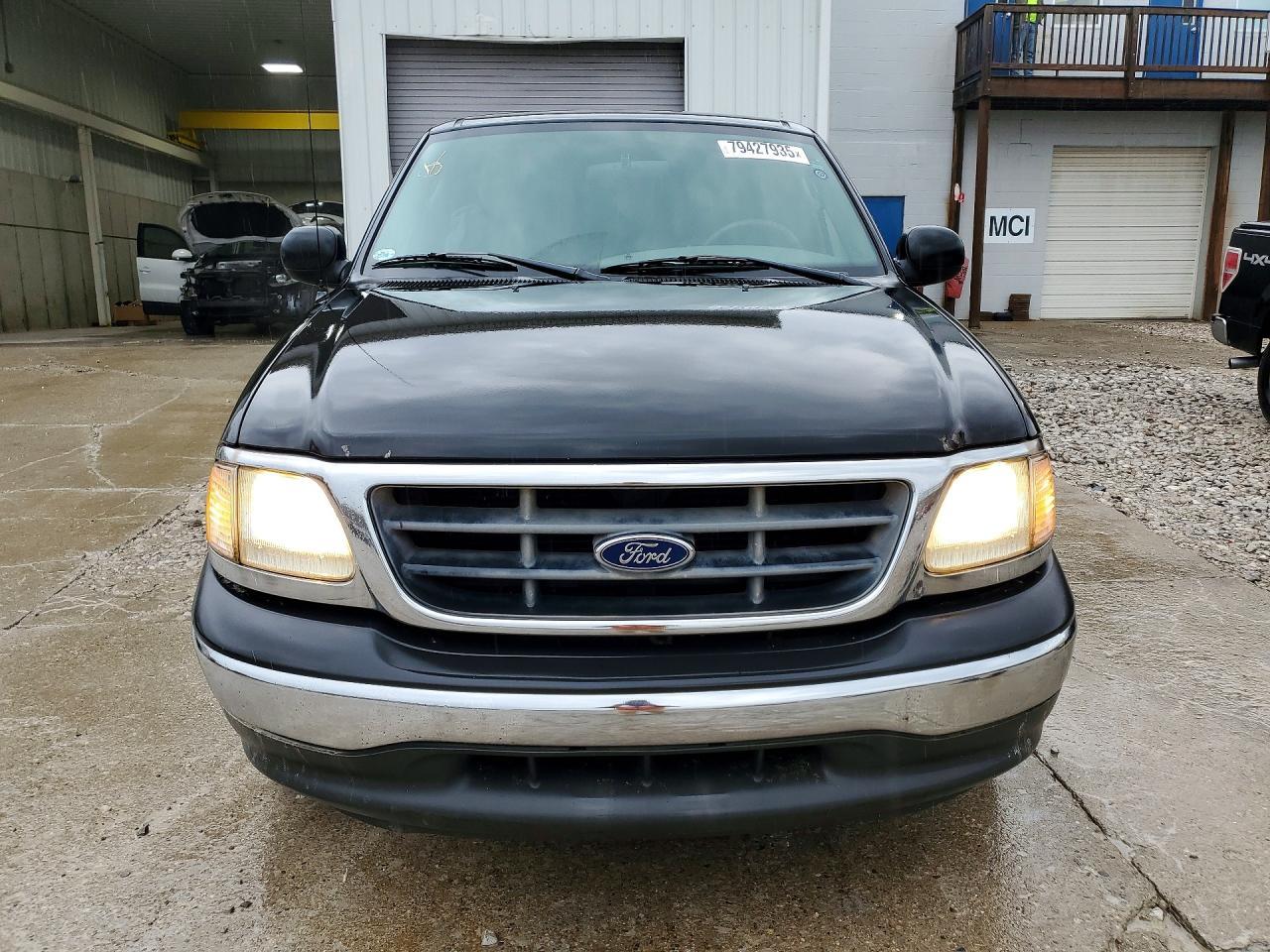2003 Ford F150 - Фото 5