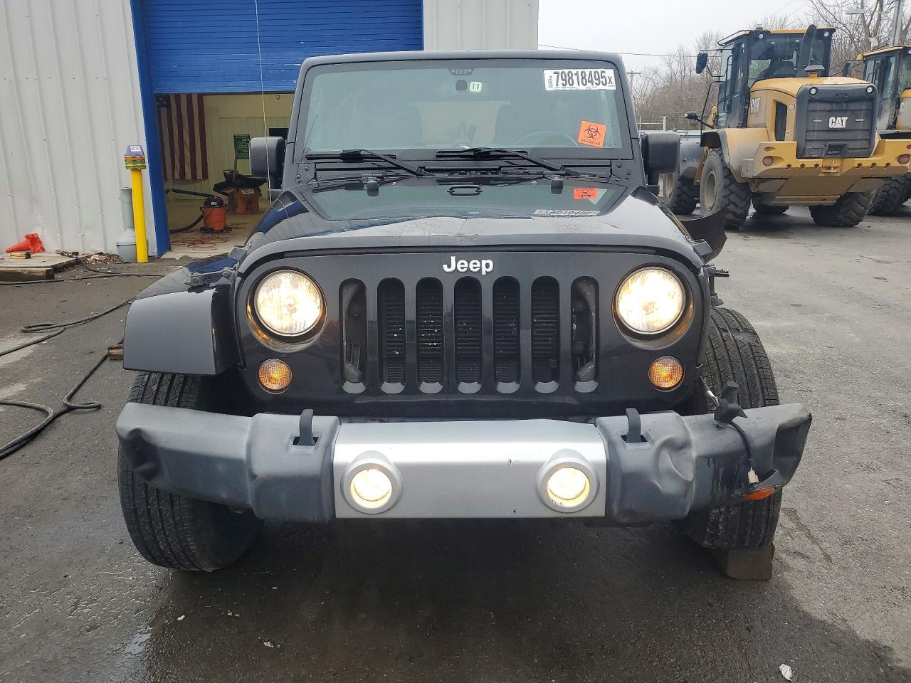 2015 Jeep Wrangler Unlimited Sahara - Фото 5