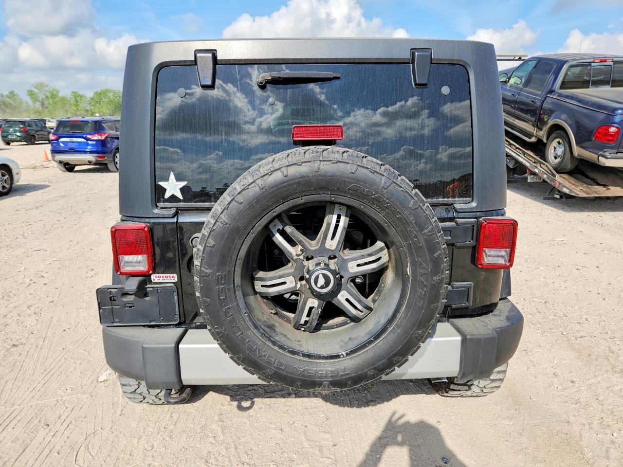 2013 Jeep Wrangler Unlimited Sahara - Фото 6