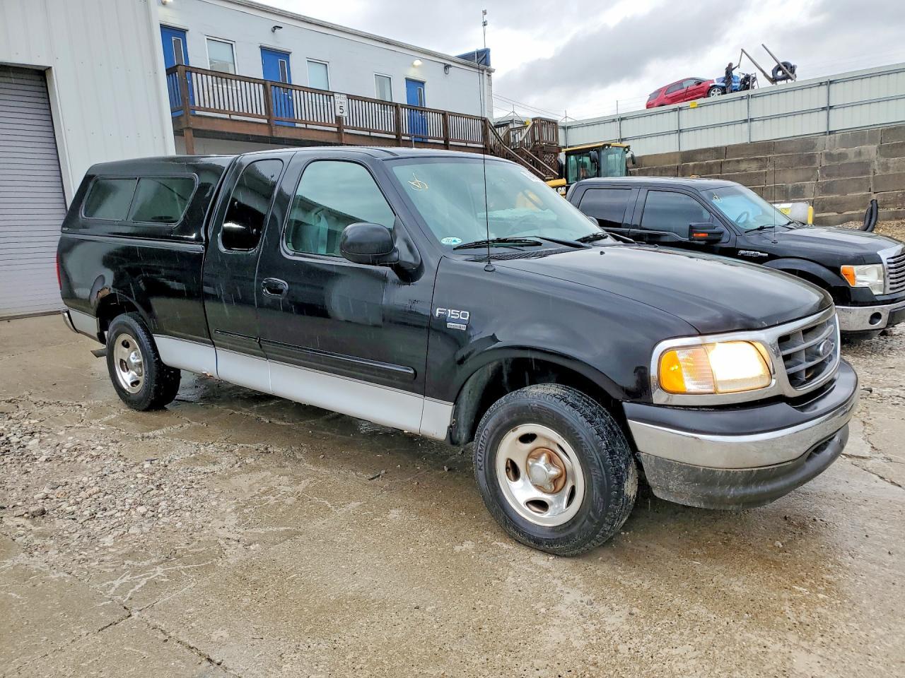 2003 Ford F150 - Фото 4