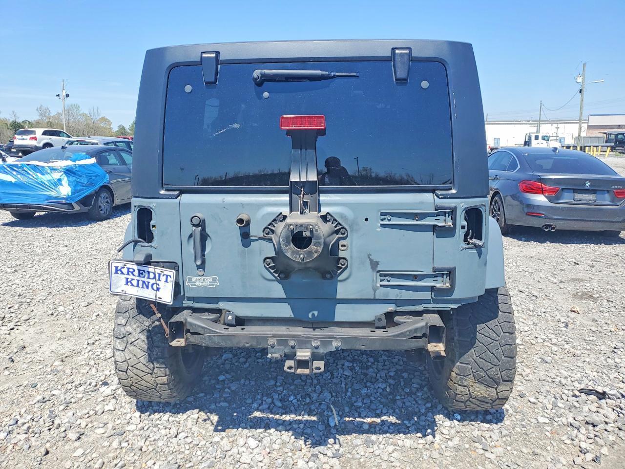 2014 Jeep Wrangler Unlimited Sahara - Фото 6