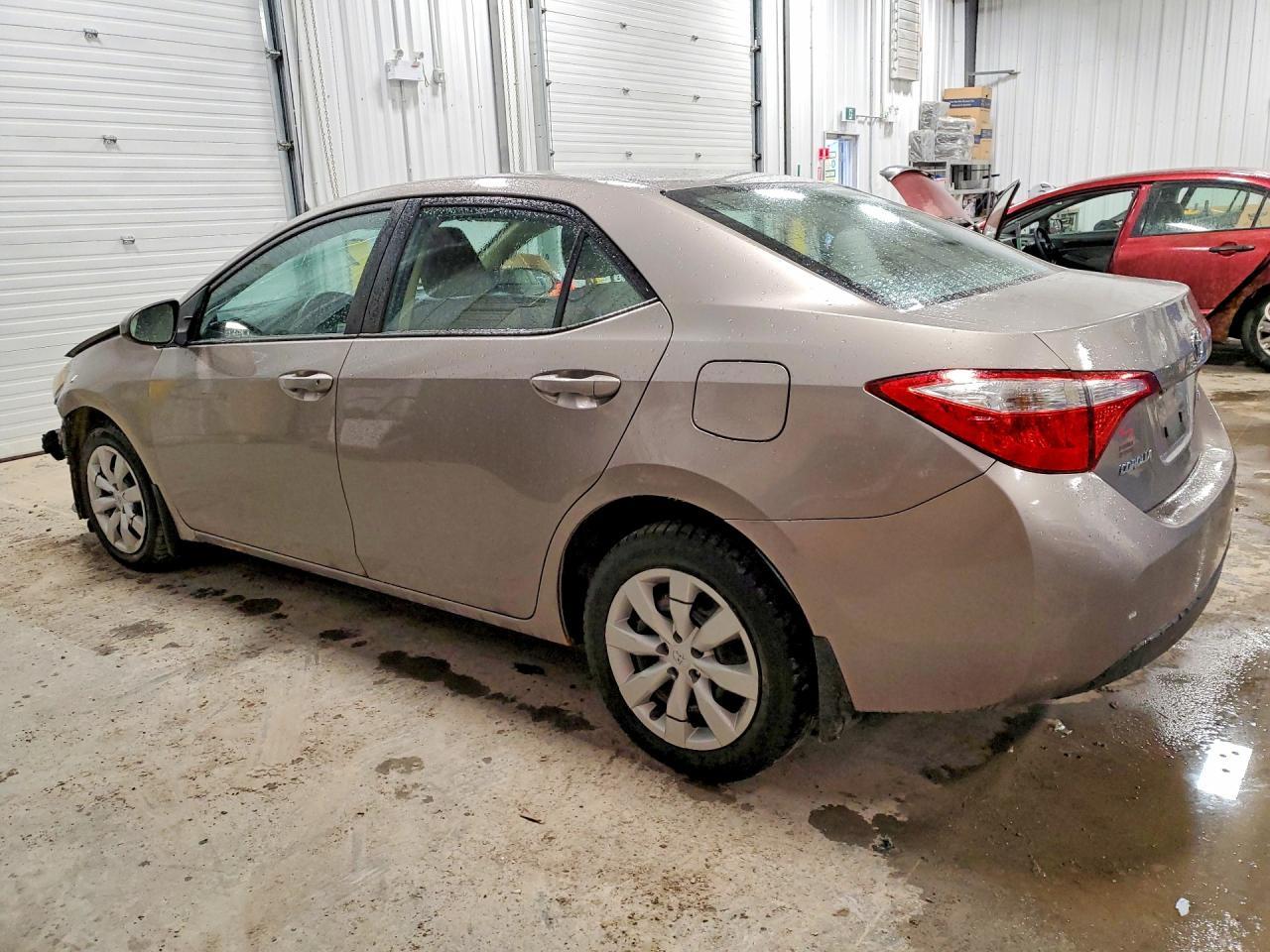 2014 Toyota Corolla L - Фото 2