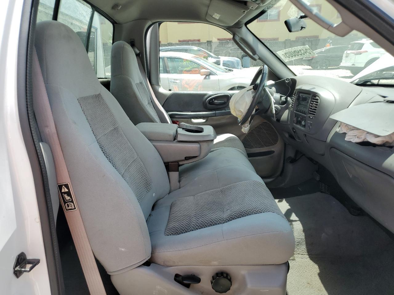 2003 Ford F150 - Фото 7