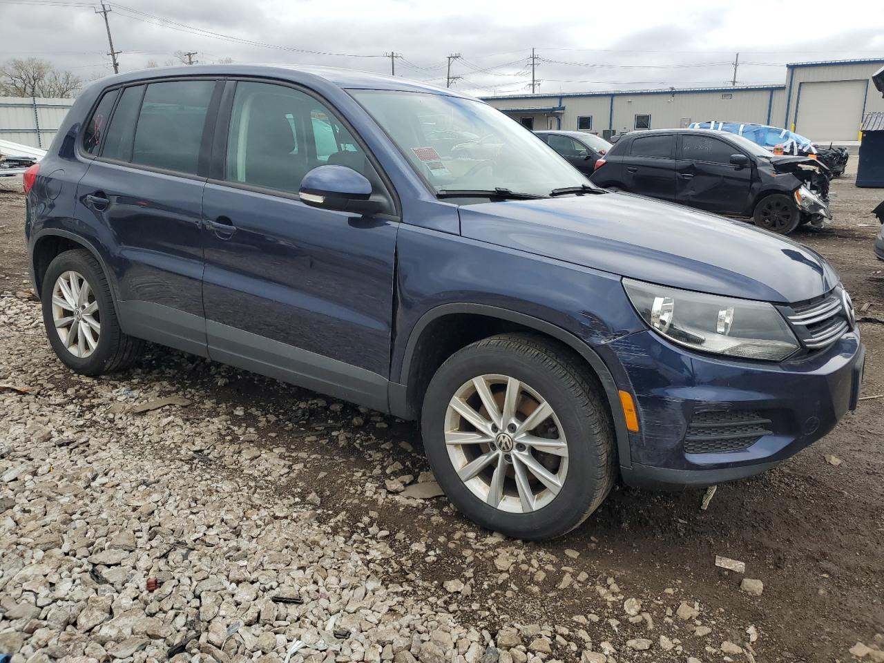 2014 Volkswagen Tiguan S - Фото 4