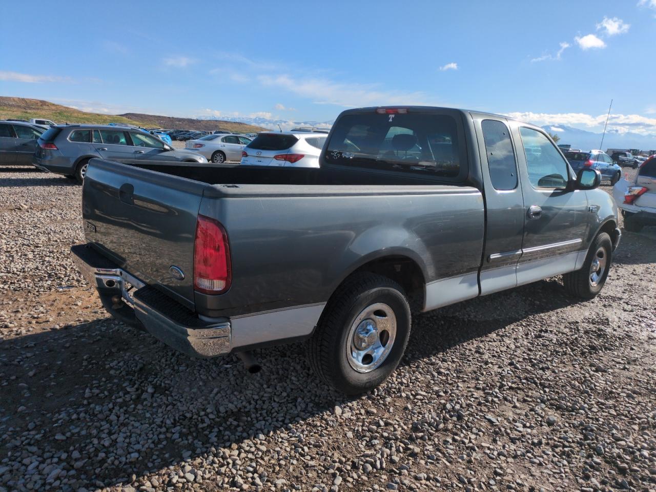 2002 Ford F150 - Фото 3