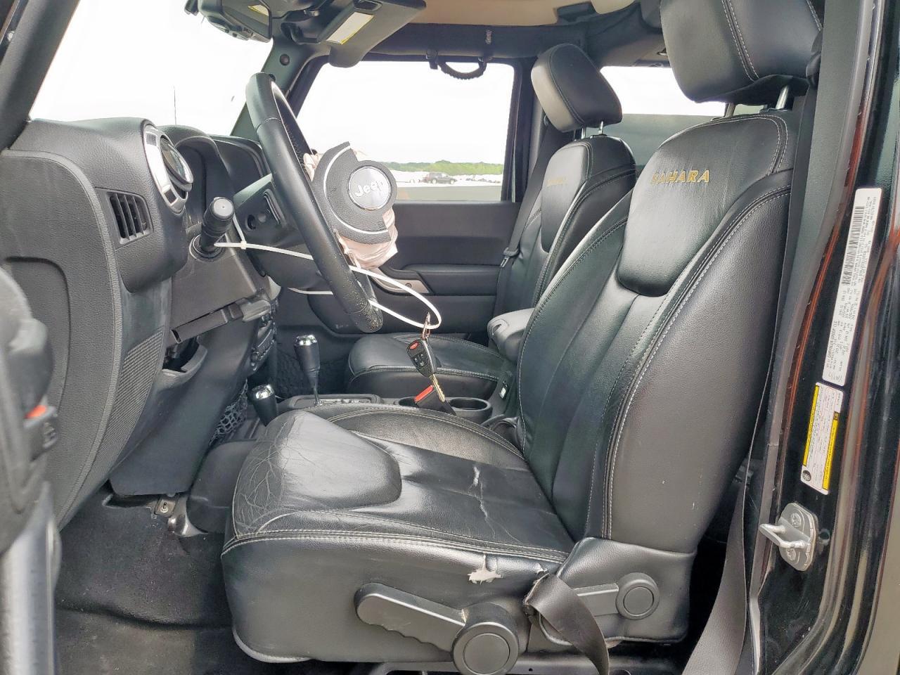 2014 Jeep Wrangler Unlimited Sahara - Фото 7