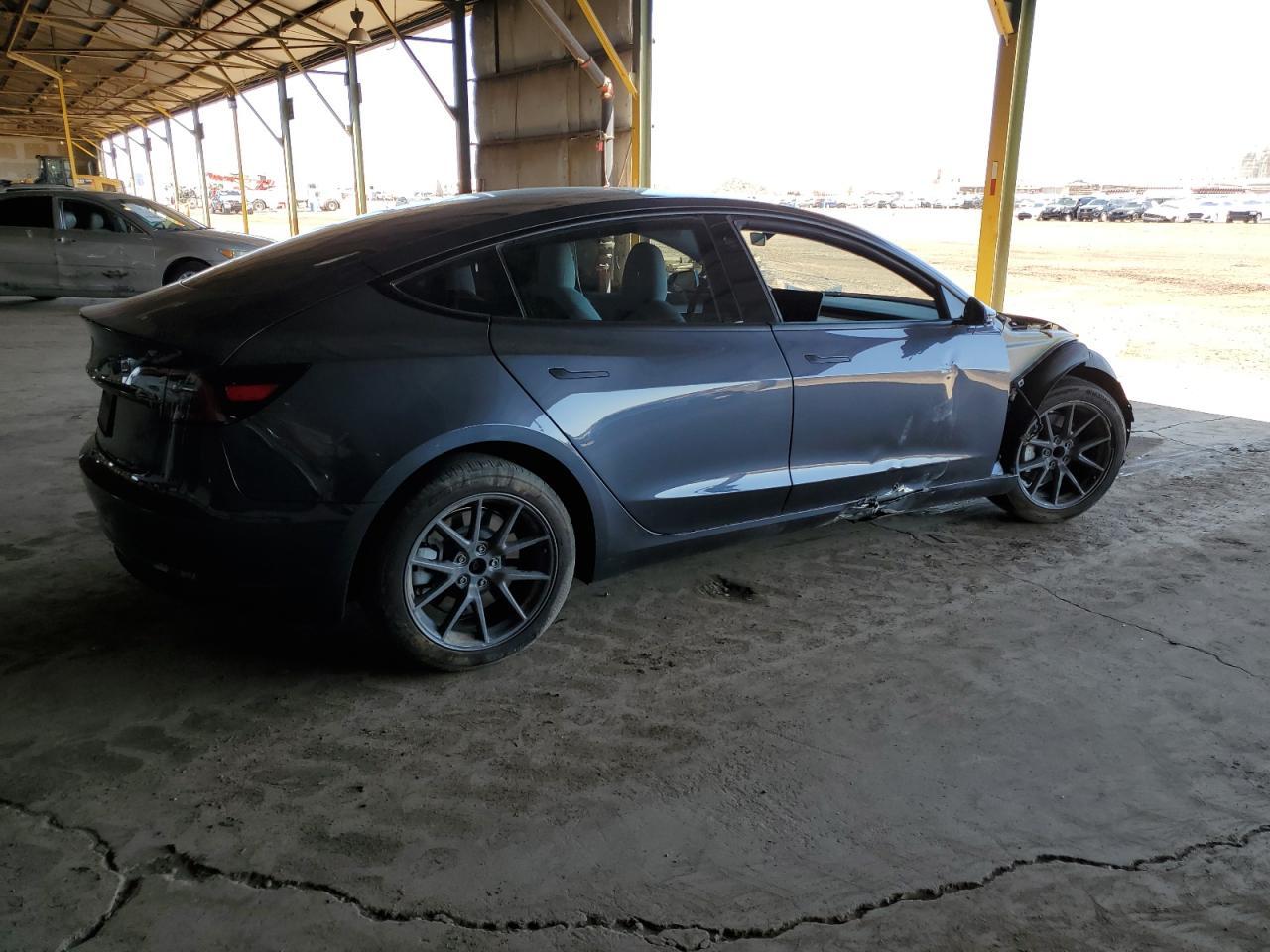 2023 Tesla Model 3 - Фото 5