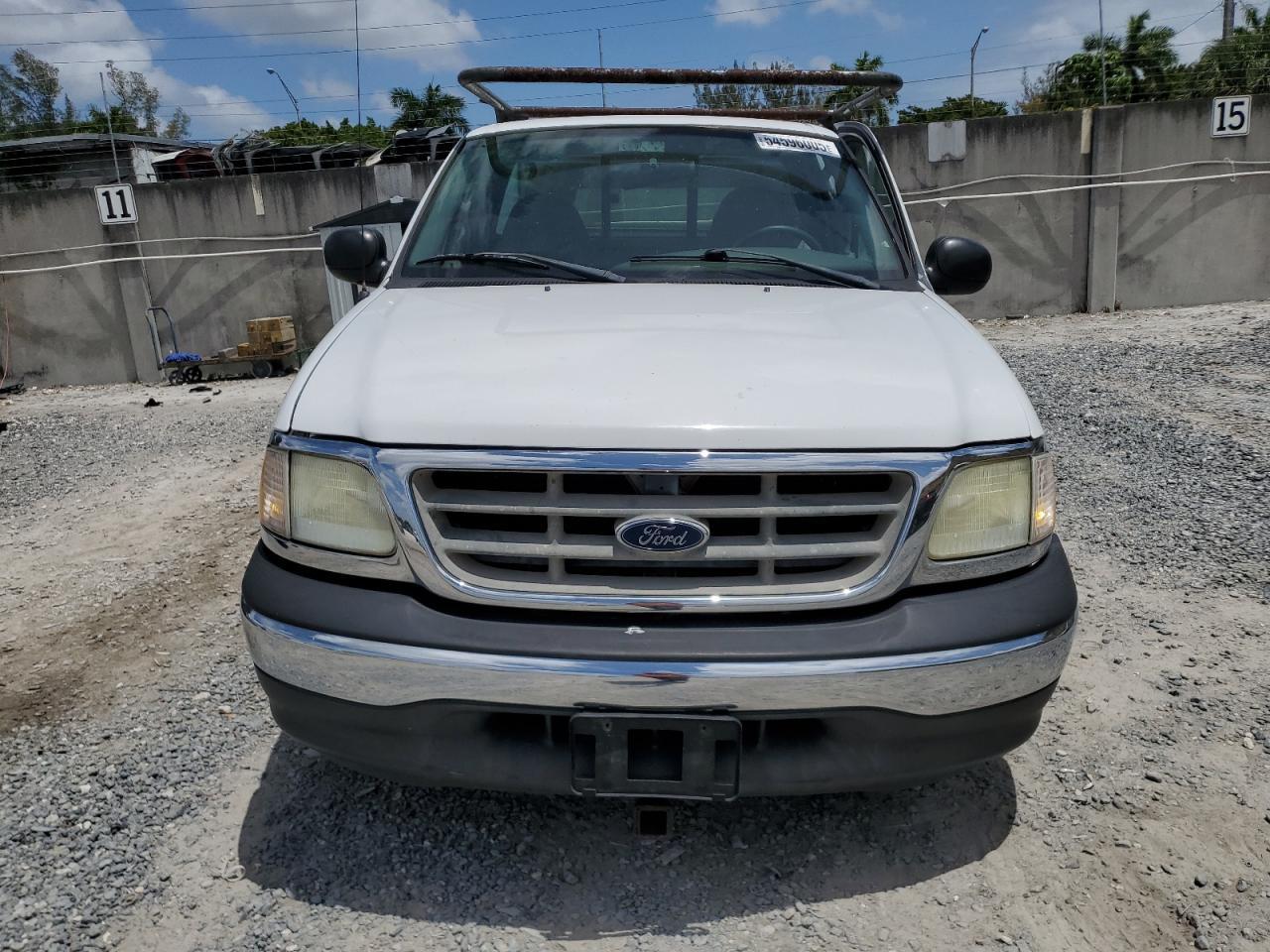 2003 Ford F150 - Фото 5