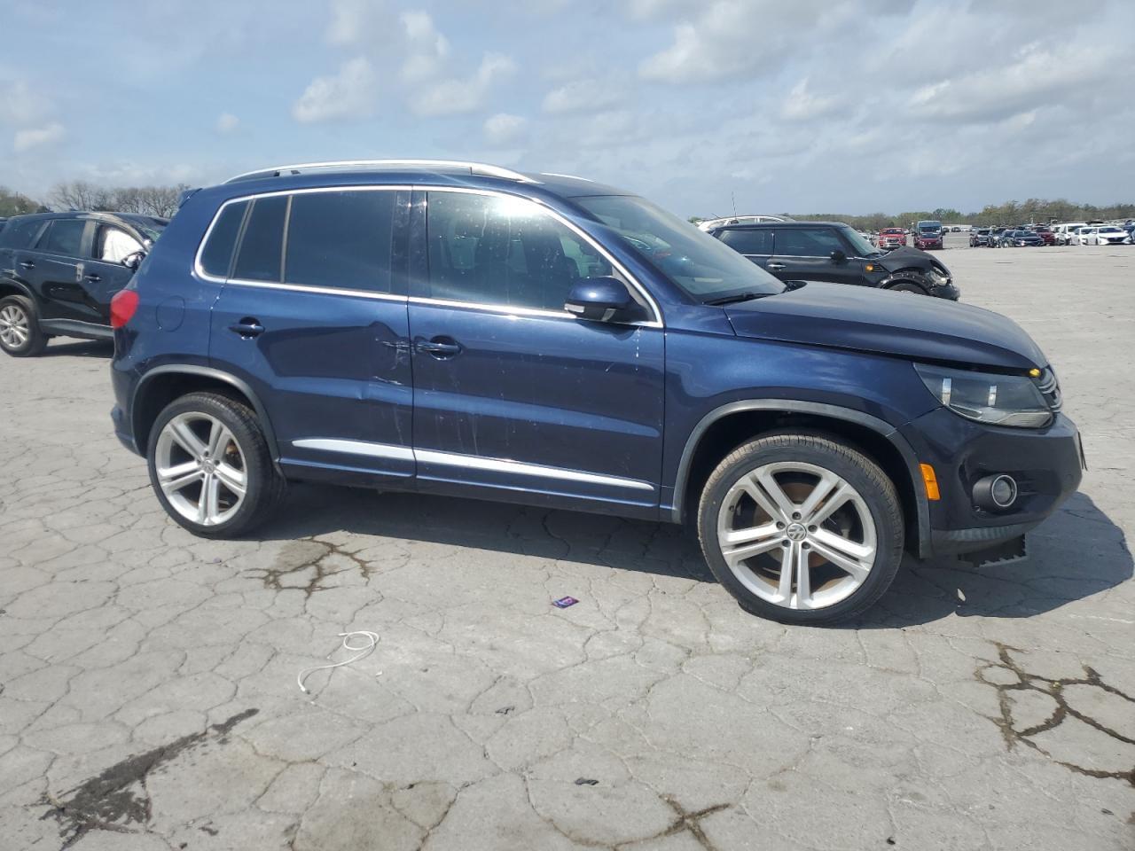 2016 Volkswagen Tiguan S - Фото 4