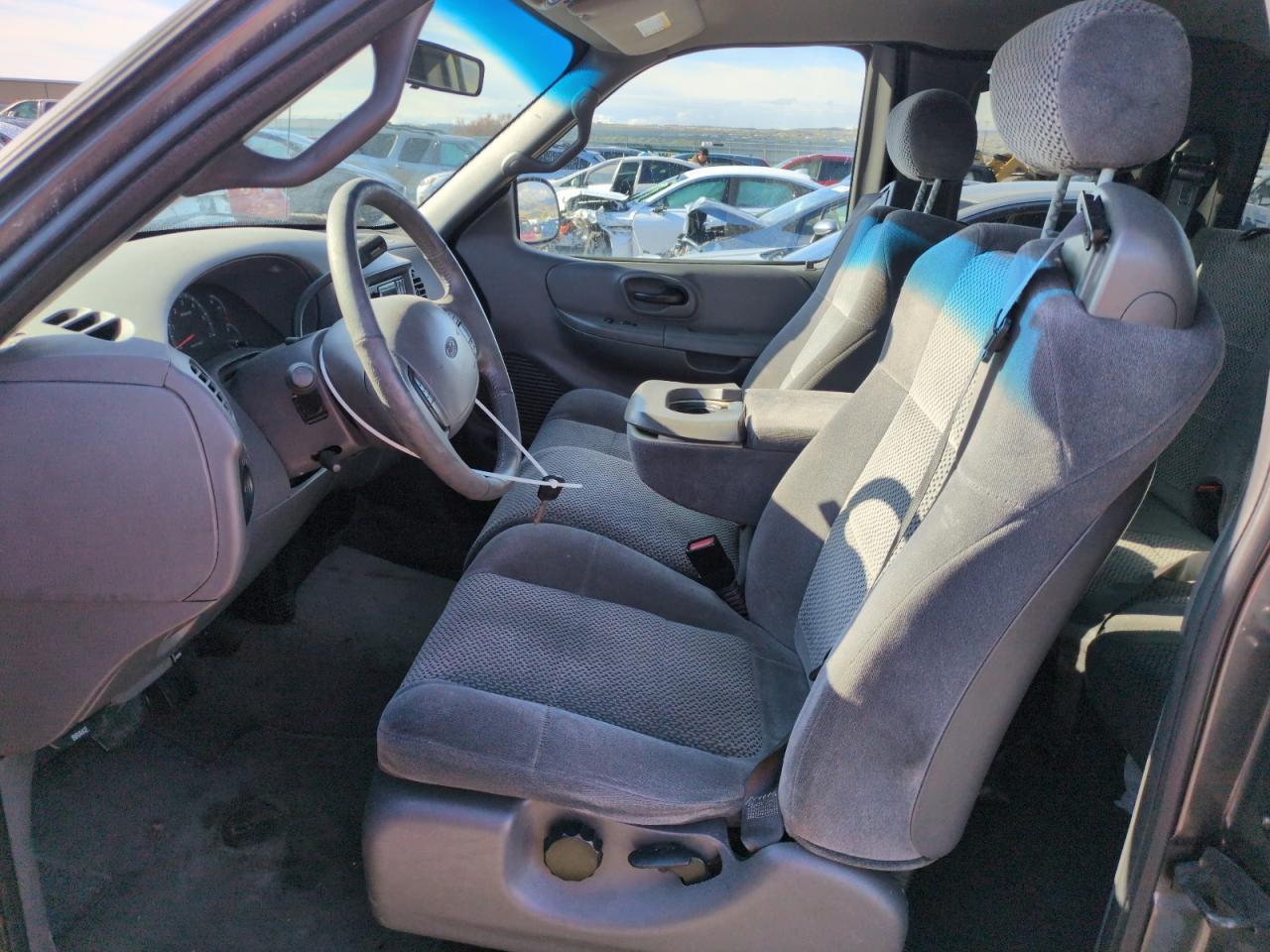 2002 Ford F150 - Фото 7