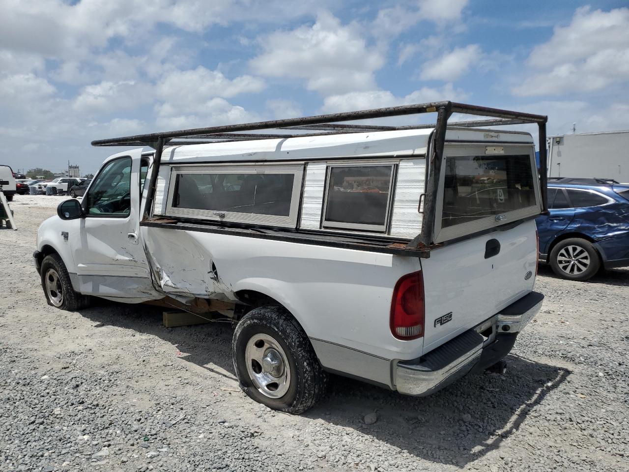 2003 Ford F150 - Фото 2