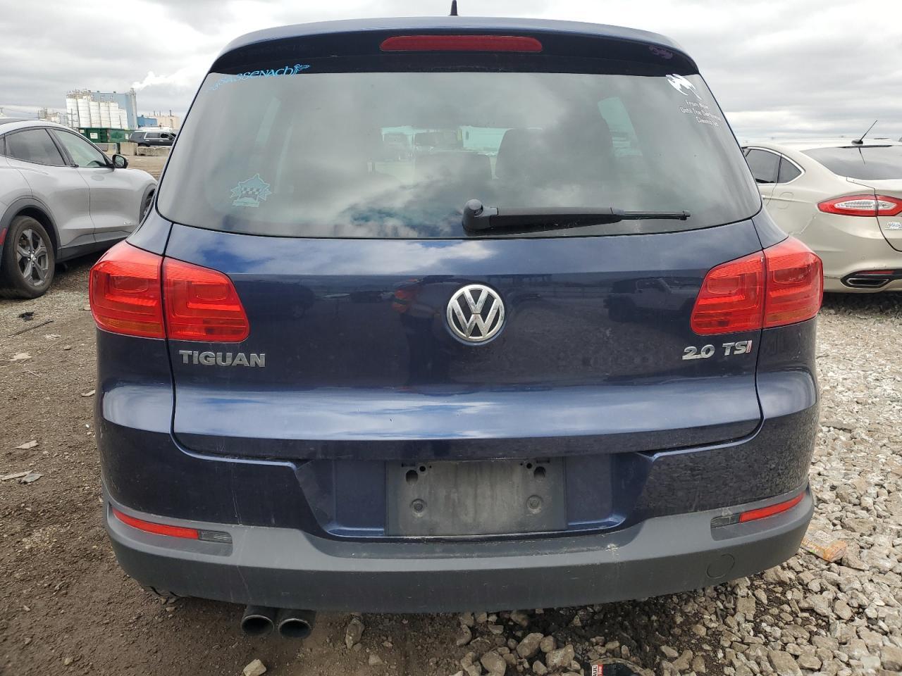2014 Volkswagen Tiguan S - Фото 6