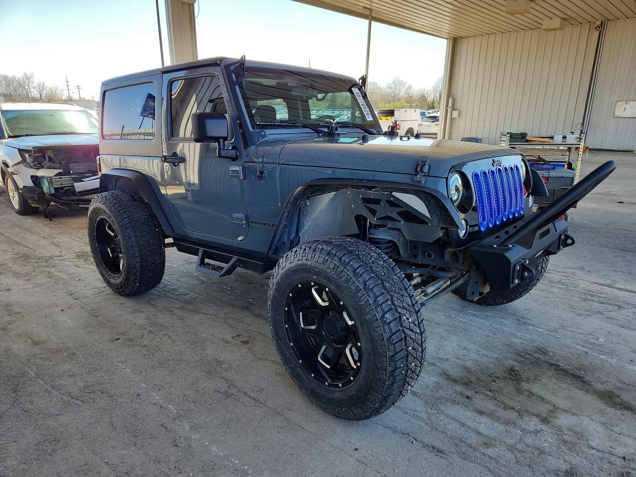 2014 Jeep Wrangler Sport - Фото 4