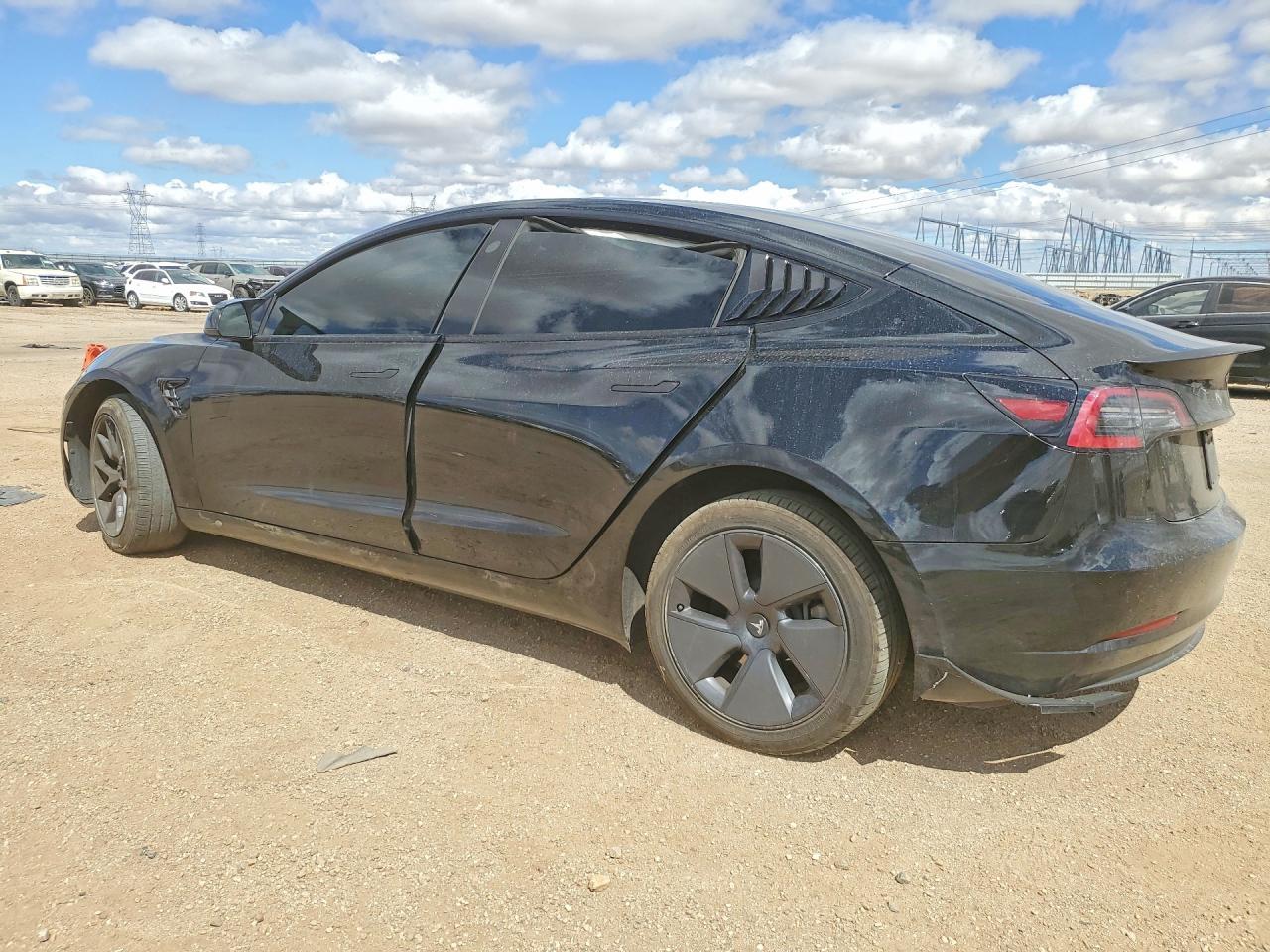 2023 Tesla Model 3 - Фото 2