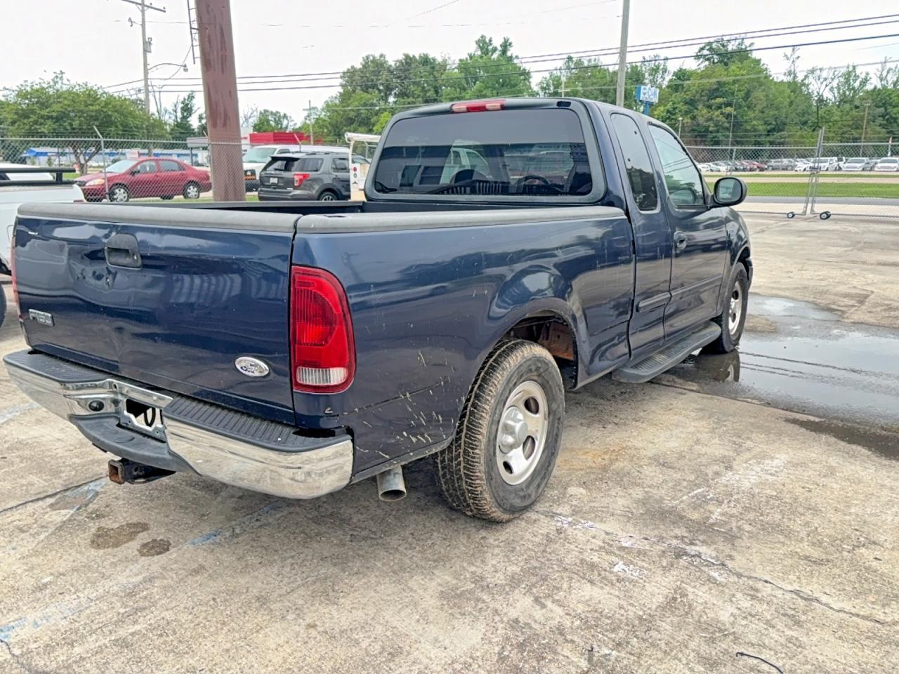 2002 Ford F150 - Фото 4