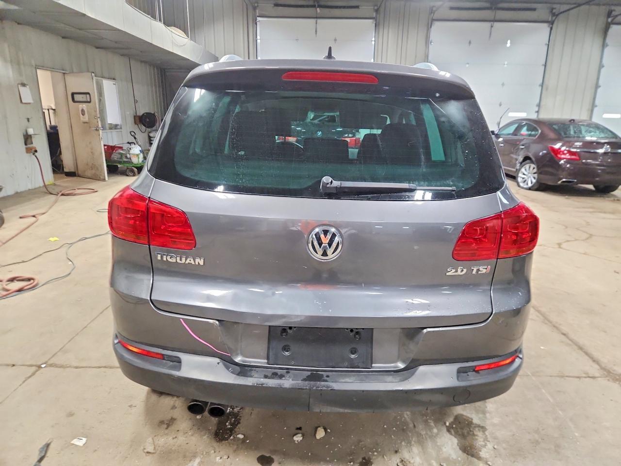 2013 Volkswagen Tiguan S - Фото 6