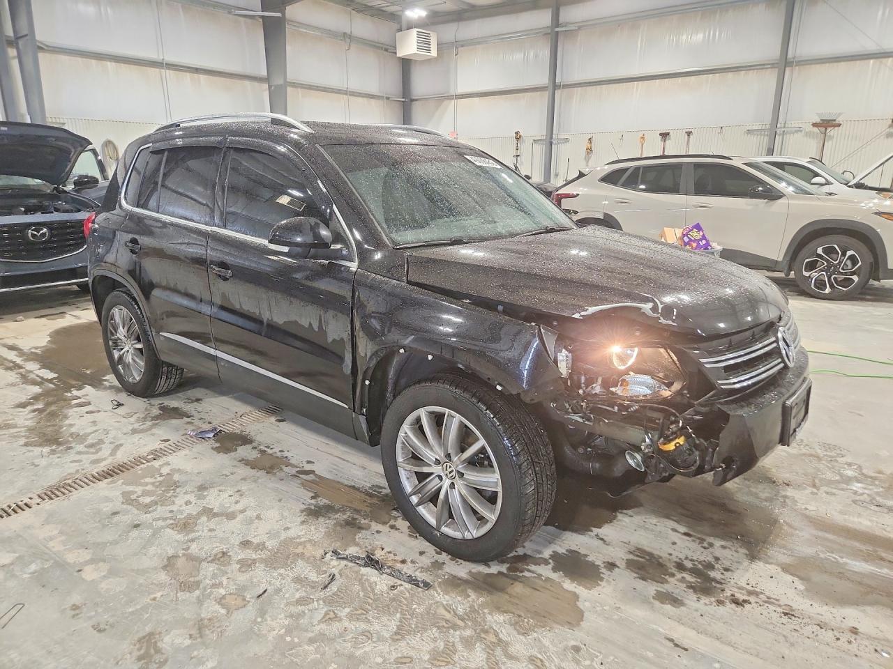 2012 Volkswagen Tiguan S - Фото 4