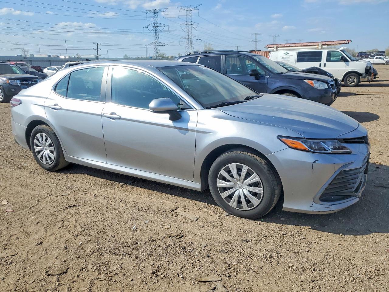 2024 Toyota Camry Hybrid Le - Фото 4