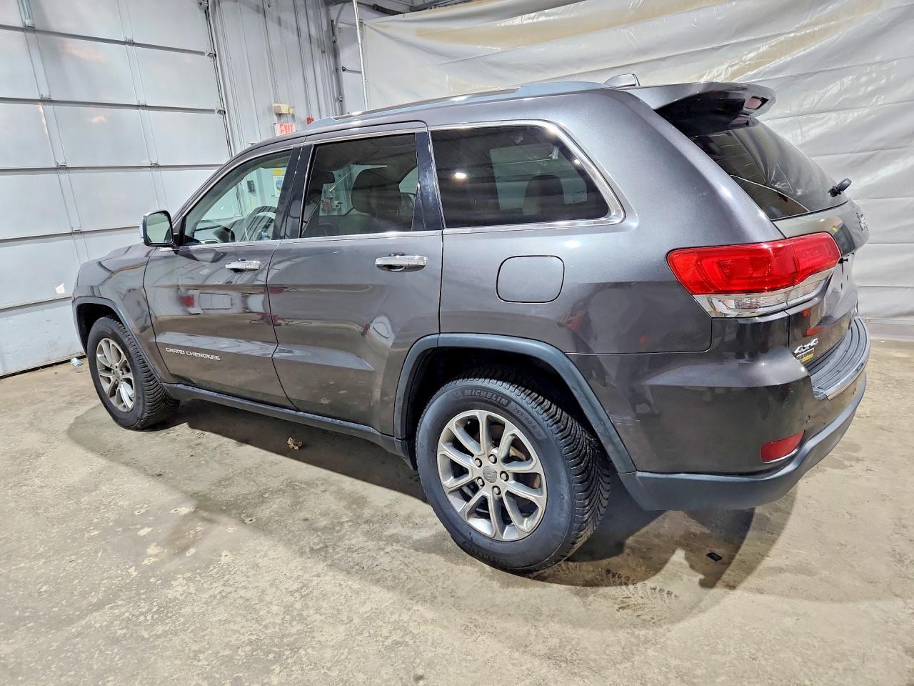 2015 Jeep Grand Cherokee - Фото 2