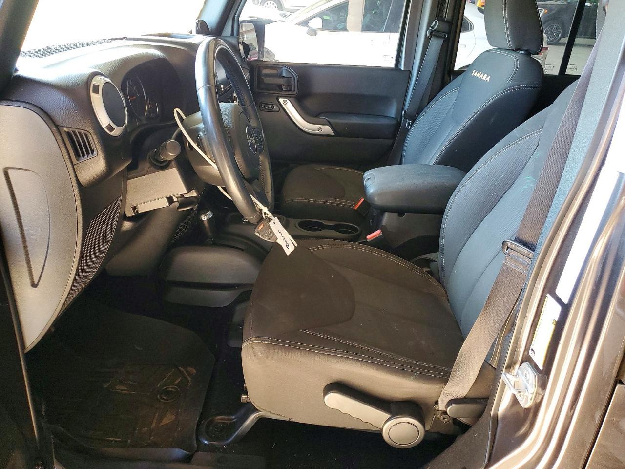 2014 Jeep Wrangler Unlimited Sahara - Фото 7