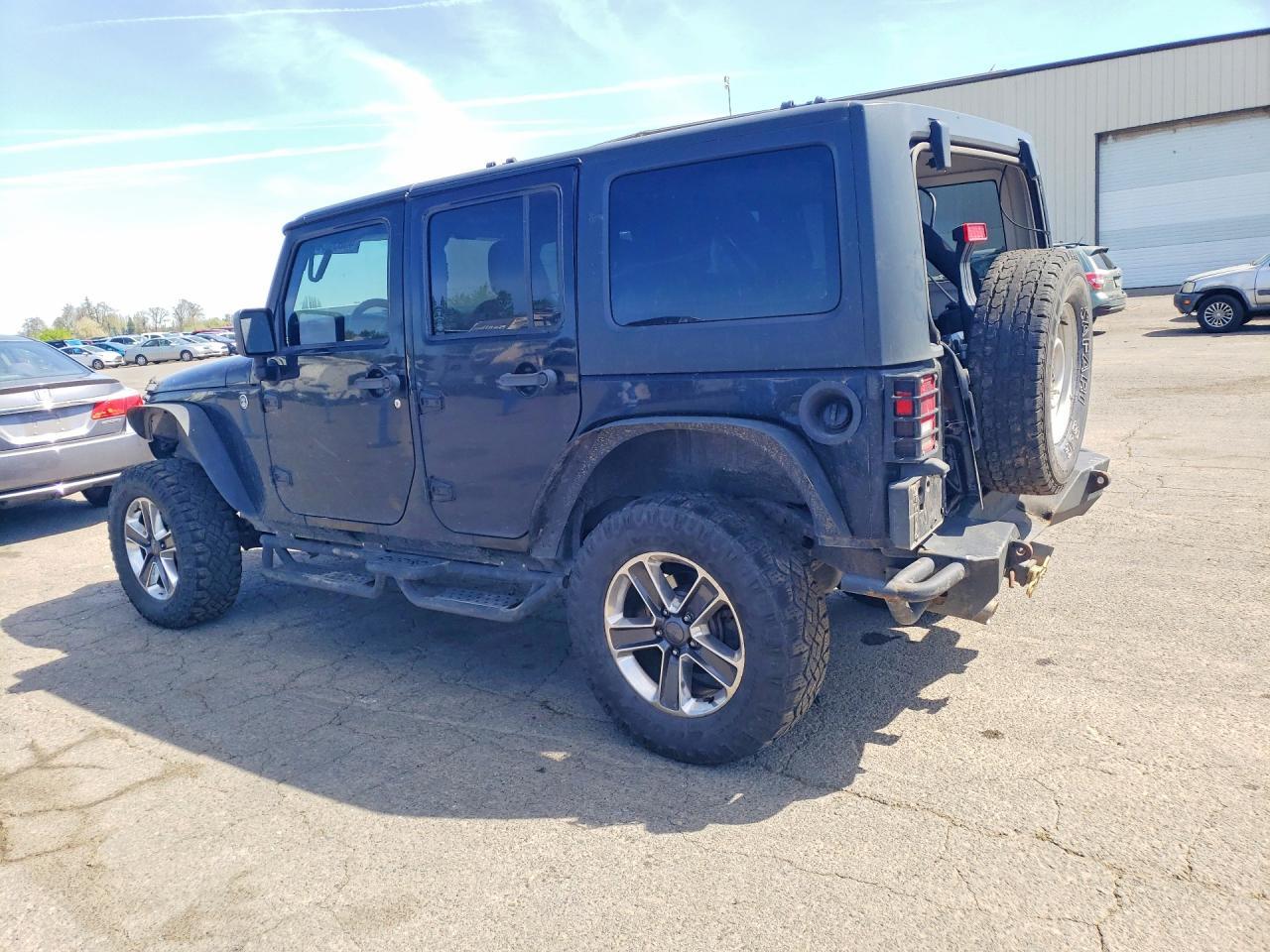 2013 Jeep Wrangler Unlimited Sport - Фото 2