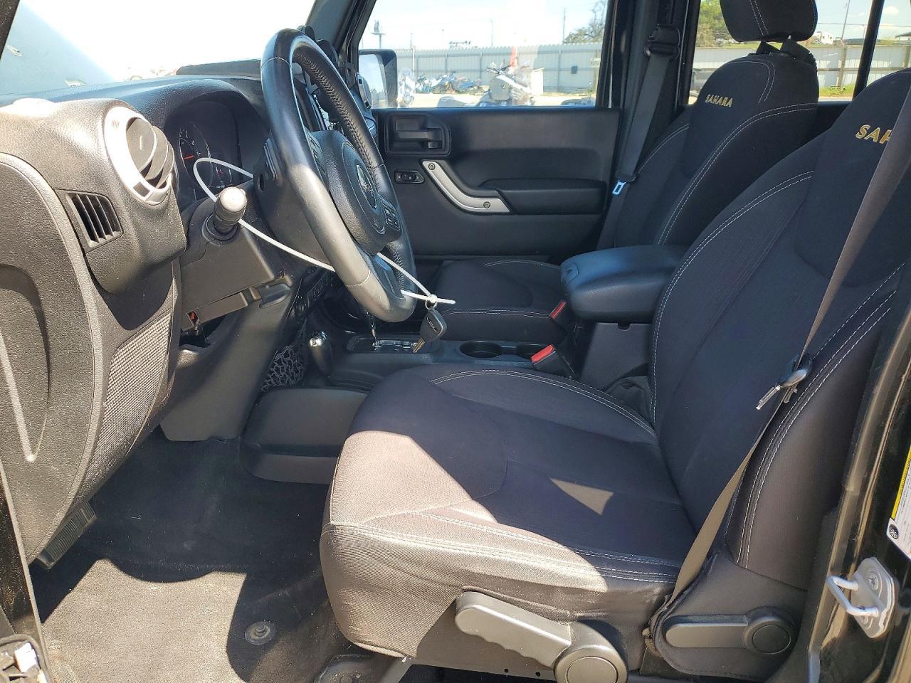 2014 Jeep Wrangler Unlimited Sahara - Фото 7