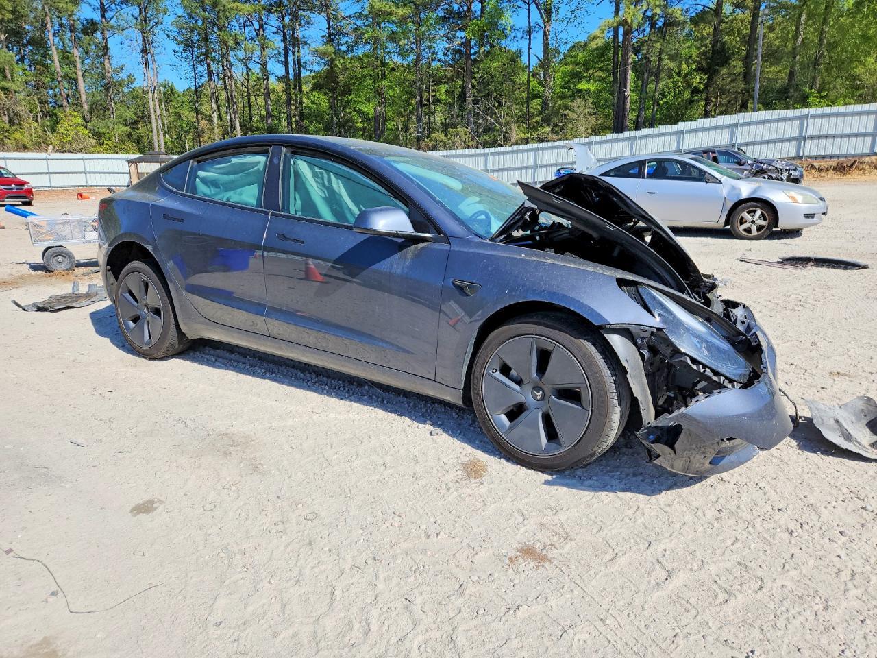 2023 Tesla Model 3 - Фото 4