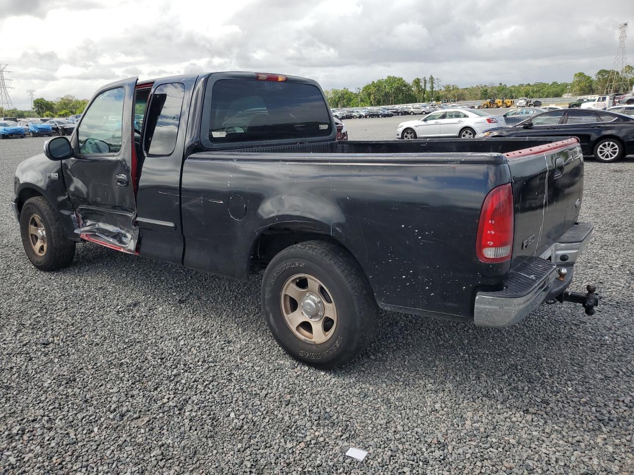 2000 Ford F150 - Фото 2