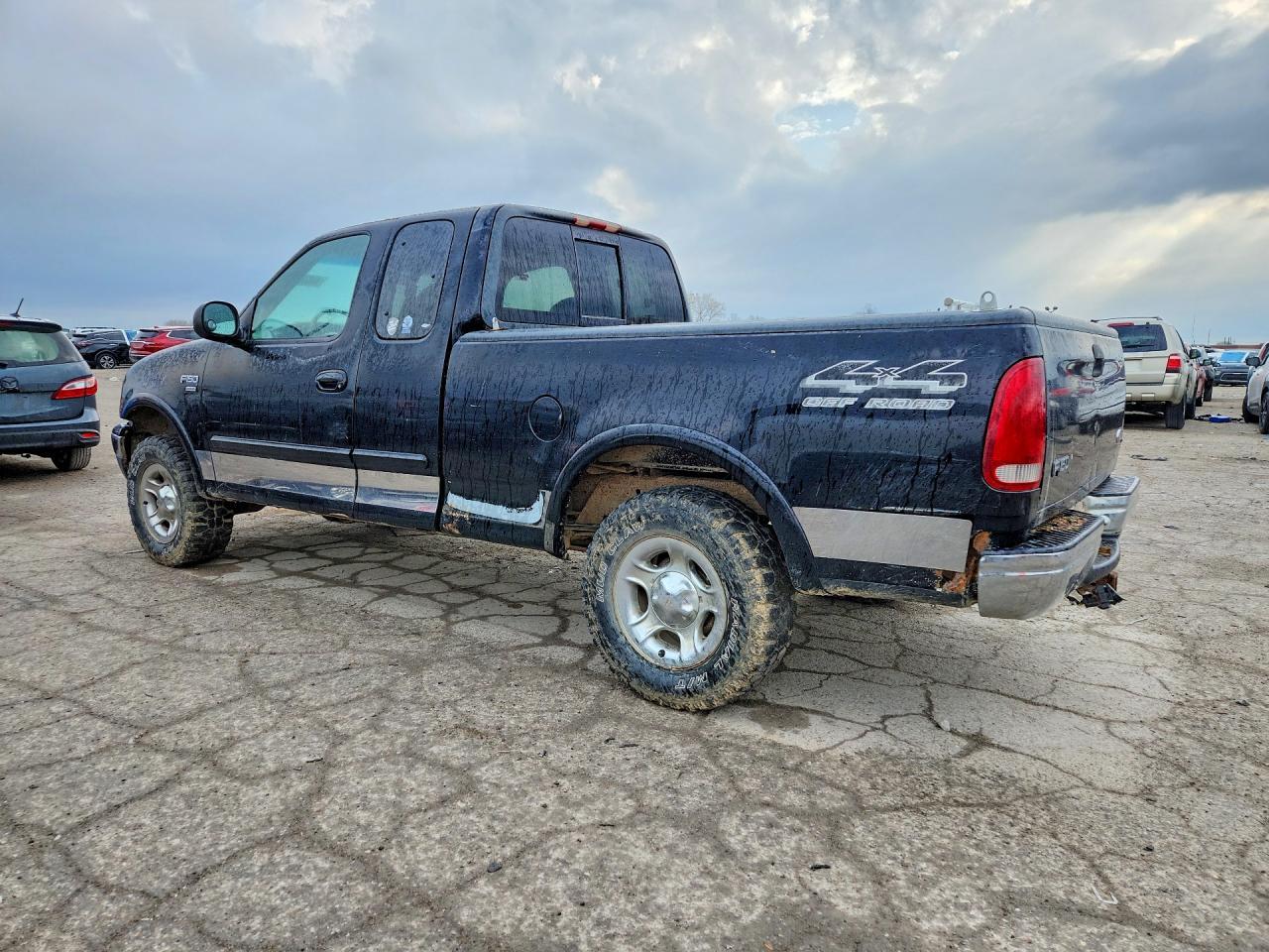 1999 Ford F150 - Фото 2