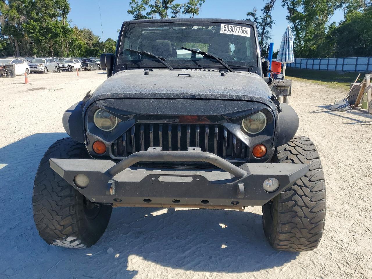 2012 Jeep Wrangler Unlimited Rubicon - Фото 5