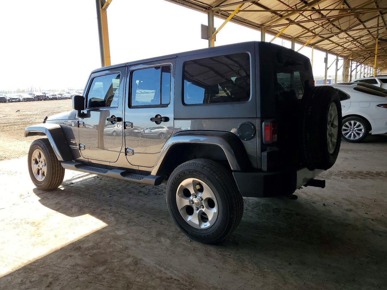 2014 Jeep Wrangler Unlimited Sahara - Фото 2
