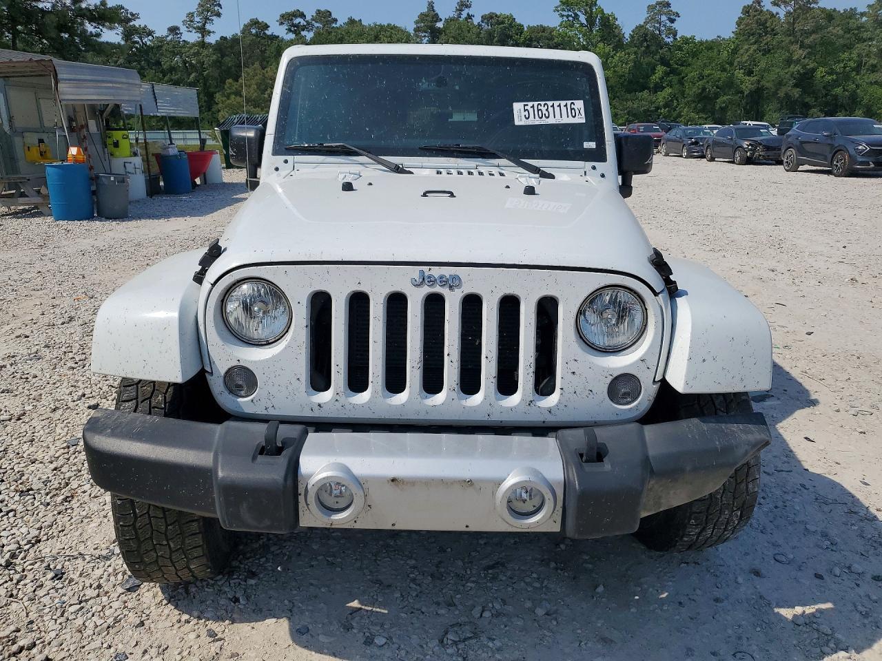 2015 Jeep Wrangler Unlimited Sahara - Фото 5